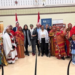 Minister Khera and a group from the African Family Revival Organization at the New Horizons for Seniors Program event in Kitchener on January 16, 2023.